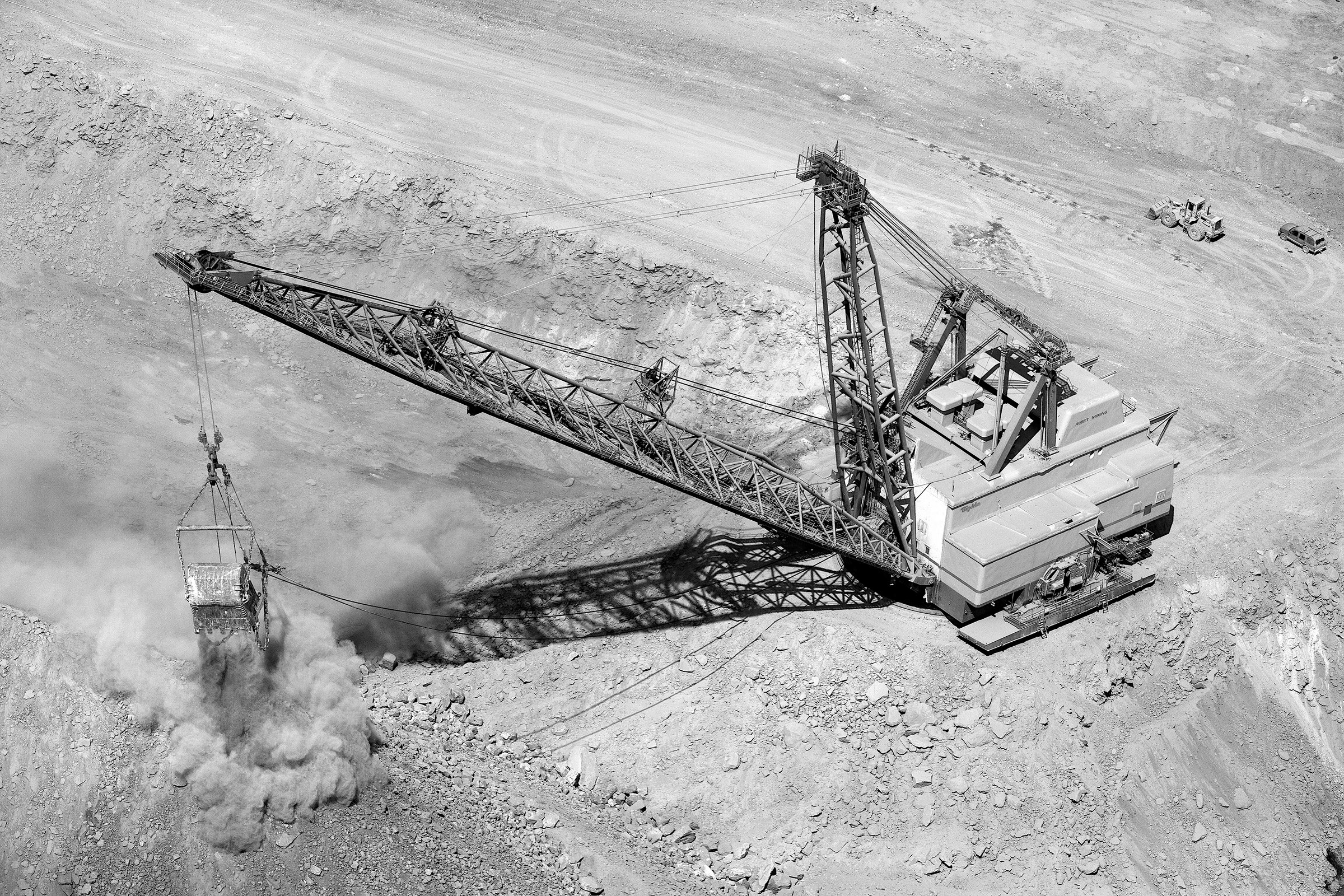 A dragline operates in a strip mine